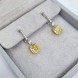 Сережки з діамантами Fancy Yellow, біле золото.