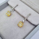 Сережки з діамантами Fancy Yellow, біле золото.