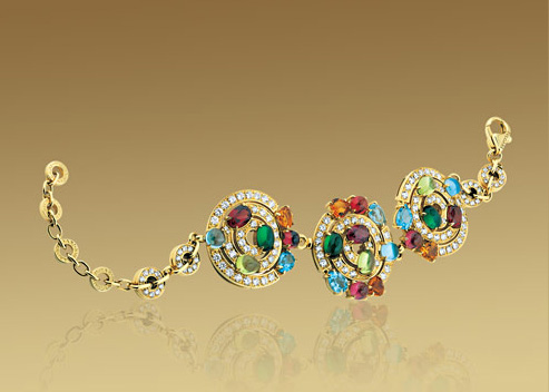 Браслет Bulgari Astrale, желтое золото, бриллианты, разноцветные камни Браслет Bulgari Astrale, желтое золото, бриллианты, разноцветные камни